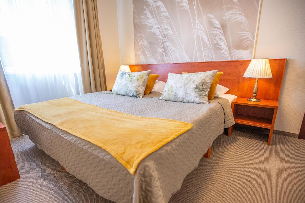 Zuvedra Hotel Ignalina Buitenkant foto